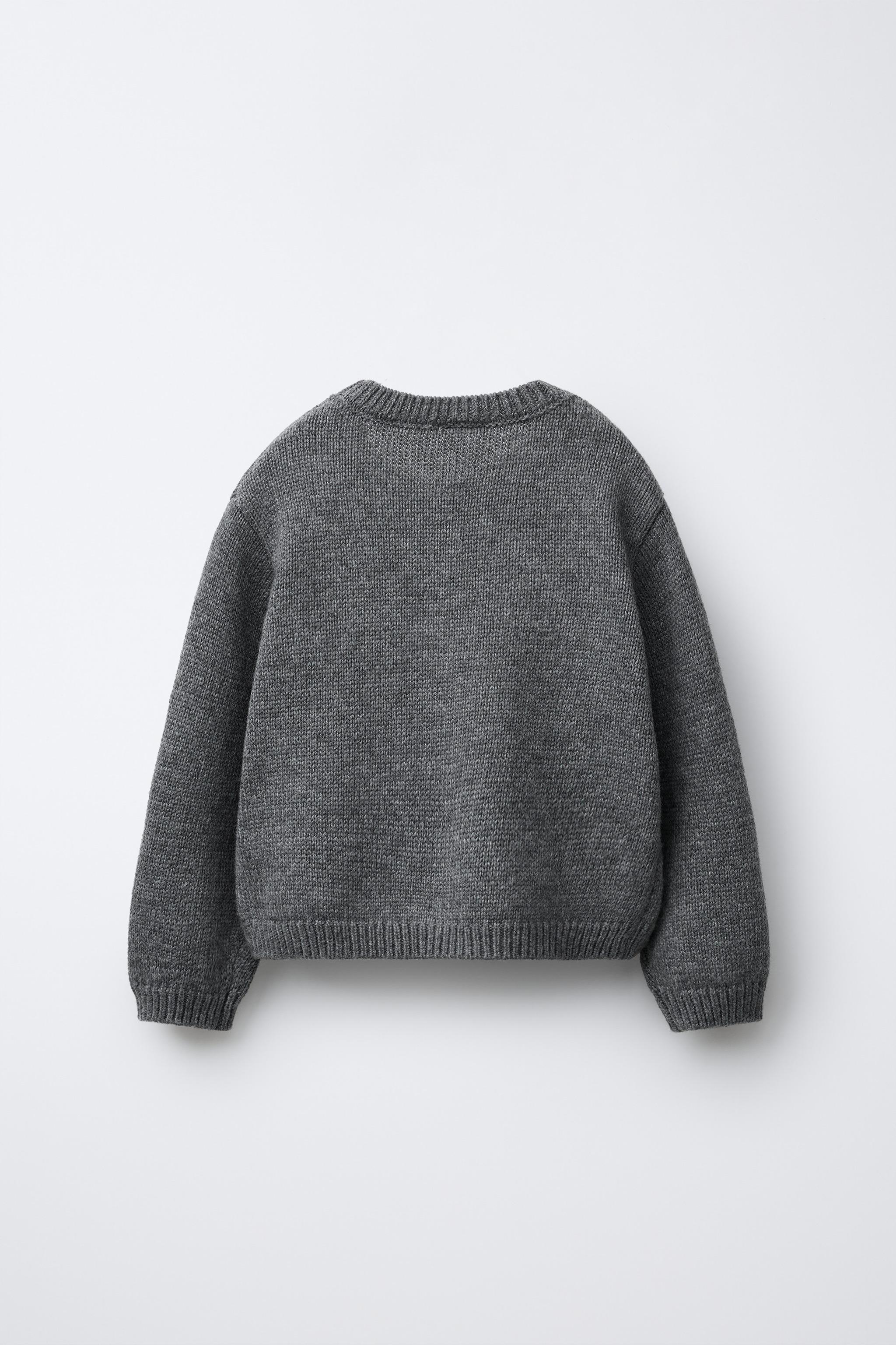 PULL EN MAILLE AVEC NŒUD VELOURS